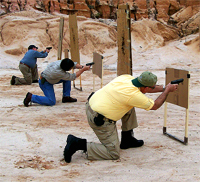 Learning to shoot from the kneeling position behind cover and concealment in our Personal Protection In The Home class.